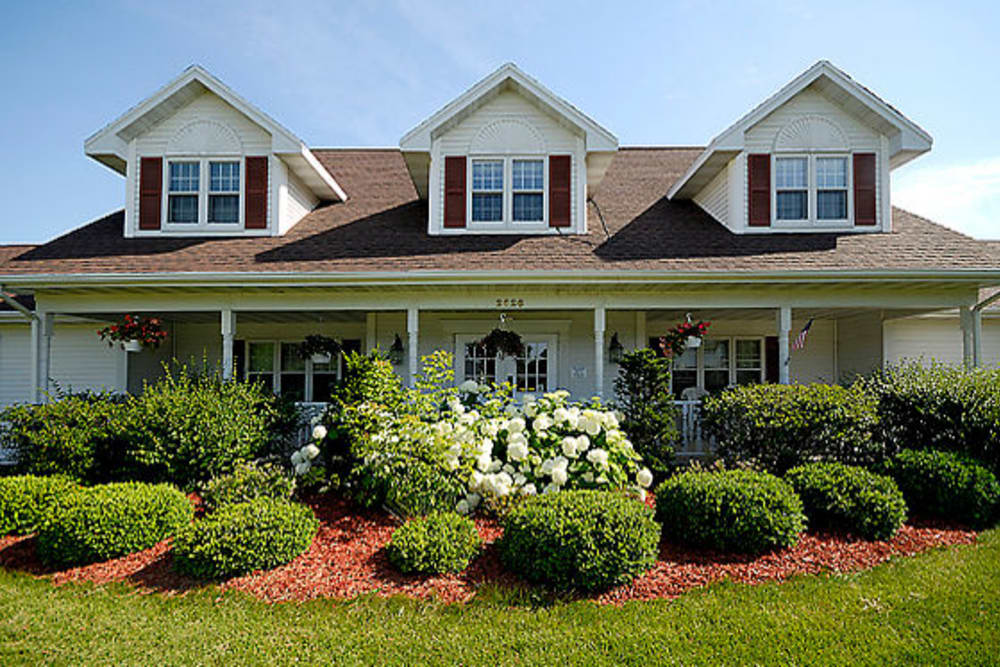 Exterior view and gardens at Carrington Assisted Living in Green Bay, Wisconsin.