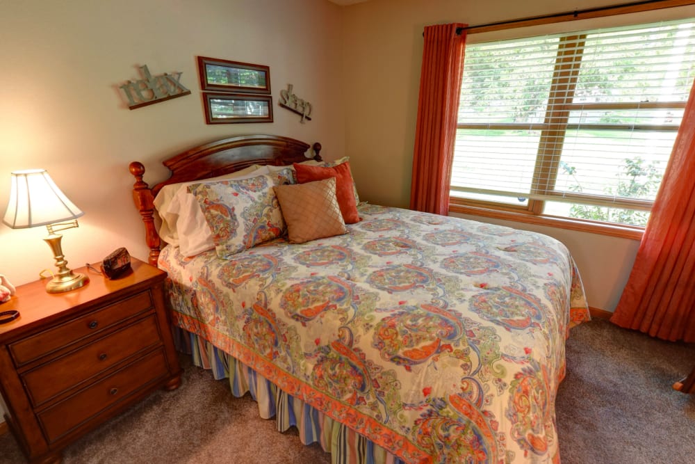 Spacious private resident bedroom at Garnett Place in Cedar Rapids, Iowa.