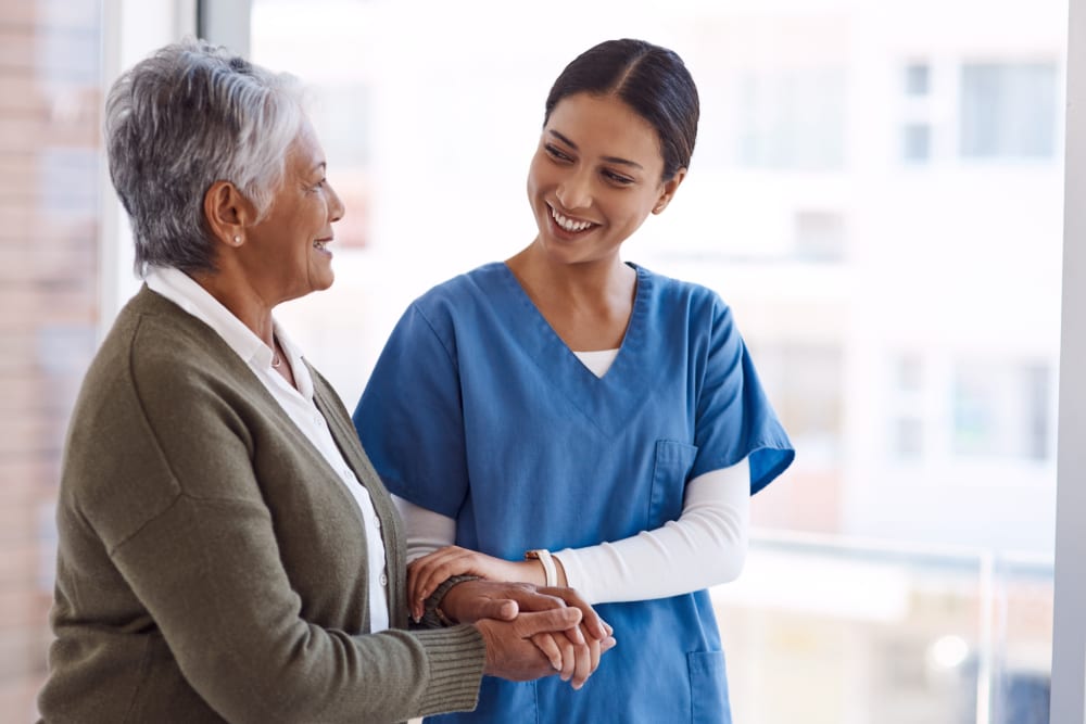 Resident consults medical staff at Carolina Assisted Living in Appleton, Wisconsin.