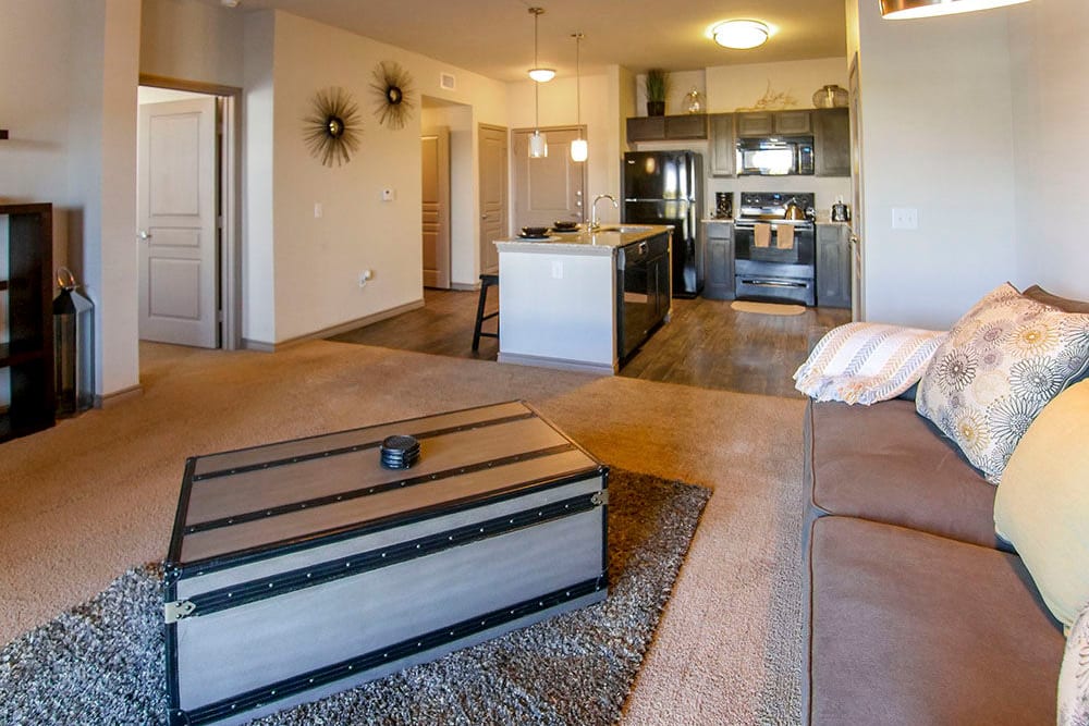 Well-furnished living area in a model home at Anatole on Briarwood in Midland, Texas