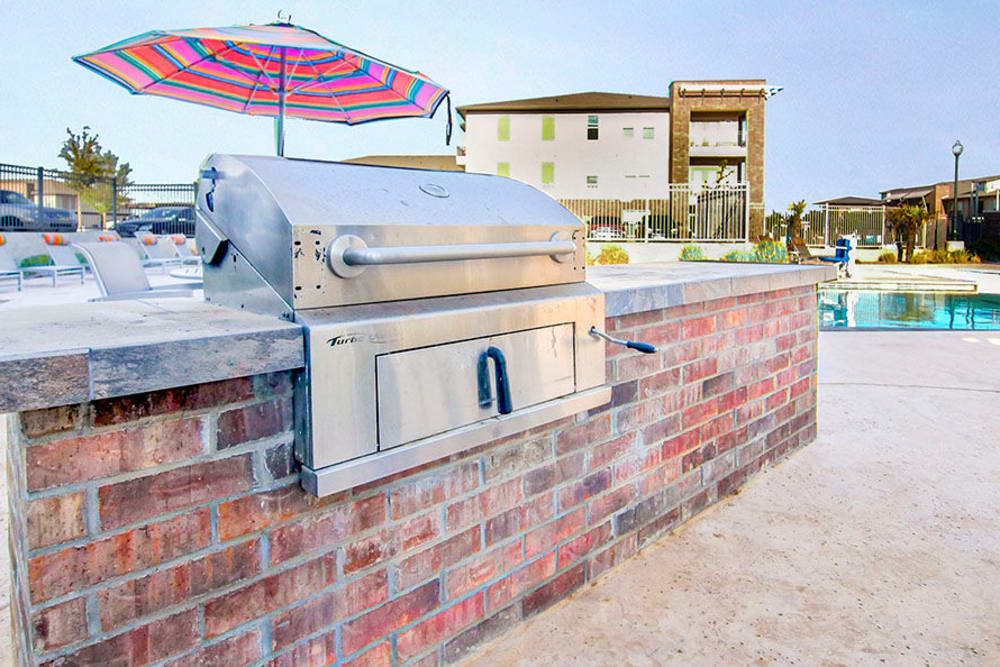 Barbecue area with gas grills at Anatole on Briarwood in Midland, Texas