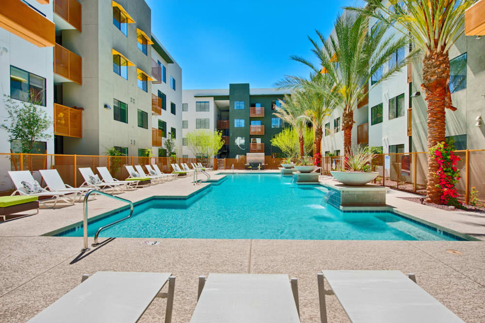 Chaise lounge chairs by the pool at Cactus Forty-2 in Phoenix, Arizona