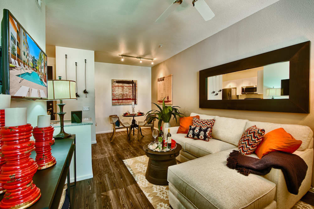 Well-furnished model home's living space at Cactus Forty-2 in Phoenix, Arizona