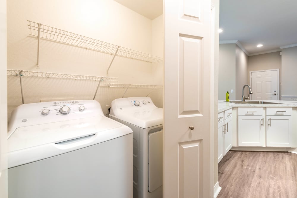 In-unit washer and dryer in a model apartment home at Cape House in Jacksonville, Florida