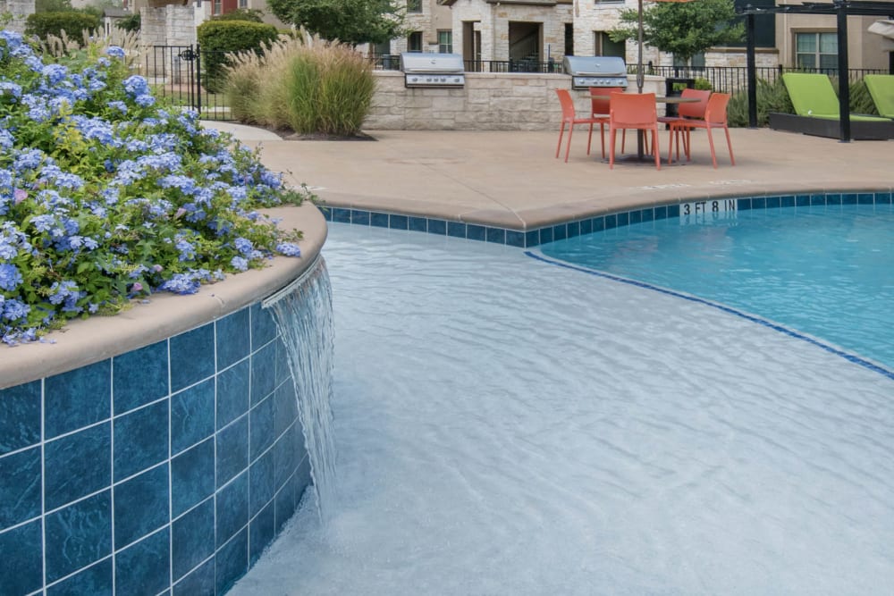 Sun deck in the pool at Carrington Oaks in Buda, Texas