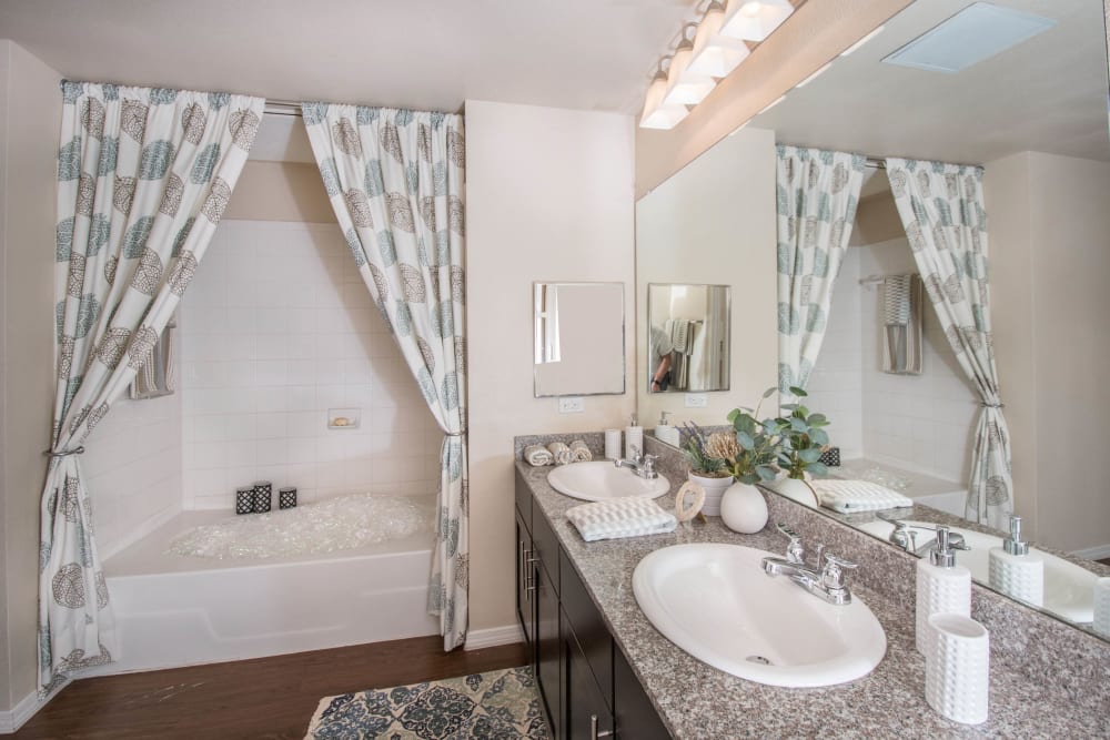 Spacious primary bathroom in a model home at Carrington Oaks in Buda, Texas