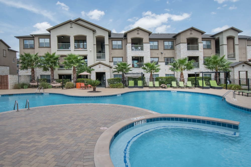 Large resort-style swimming pool at Carrington Oaks in Buda, Texas