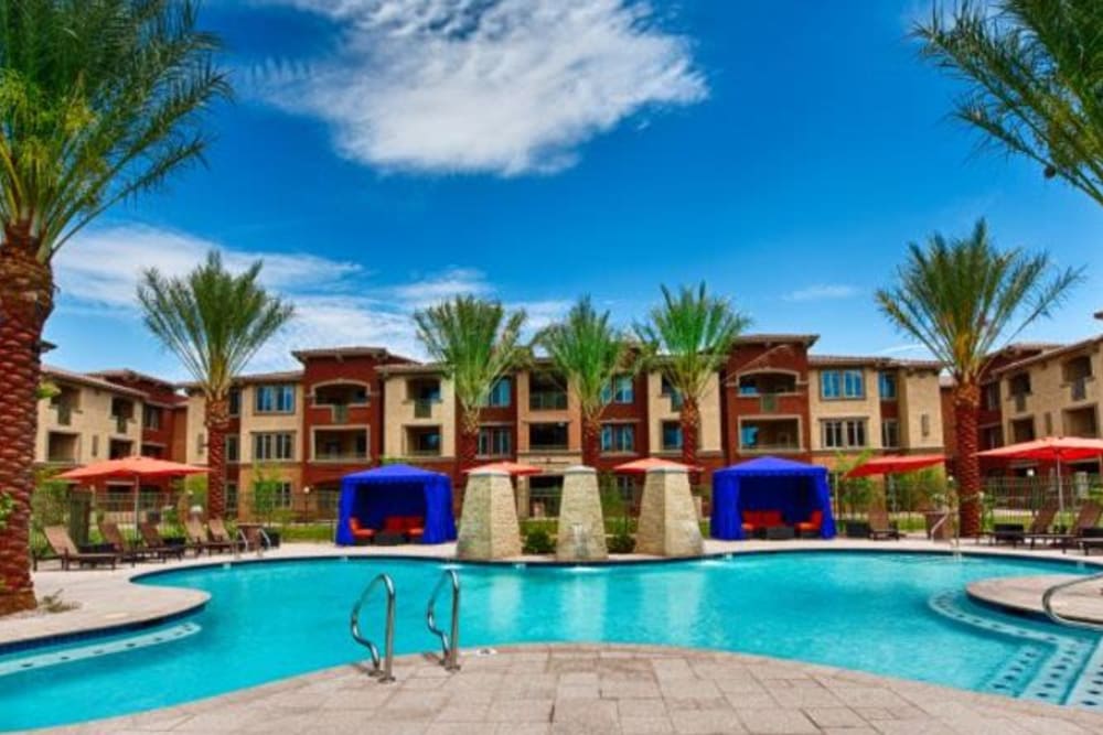 Resort-style swimming pool on a beautiful day at Elevation Chandler in Chandler, Arizona