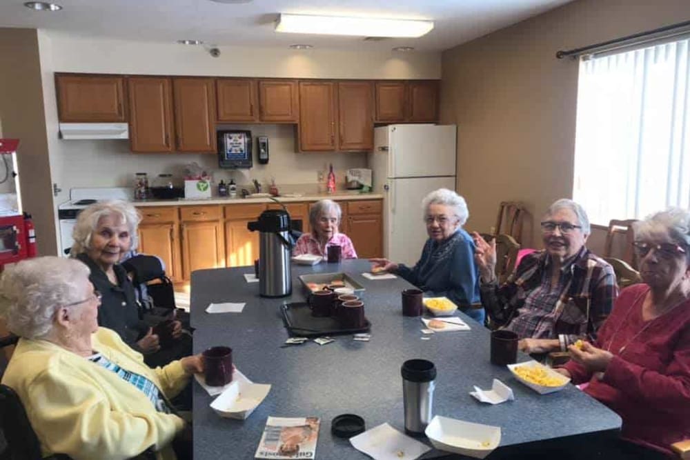 Residents enjoy coffee social hour at Lawton Senior Living in Lawton, Iowa.
