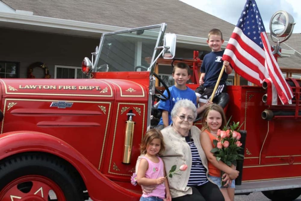 Residents enjoy visits from grandchildren at Lawton Senior Living in Lawton, Iowa. 