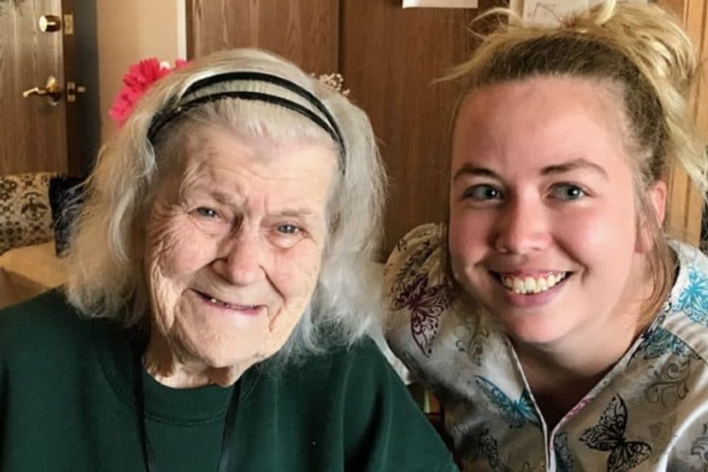 Resident and granddaughter visiting at Lawton Senior Living in Lawton, Iowa.