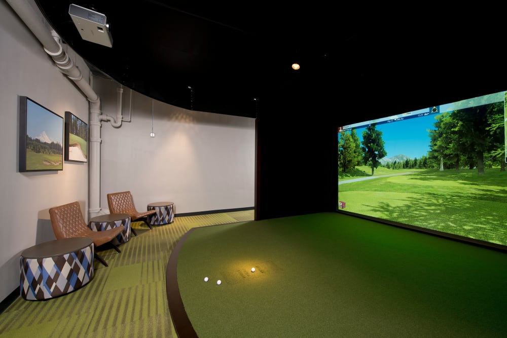 Indoor virtual golf for resident use at Harrison Tower in Portland, Oregon