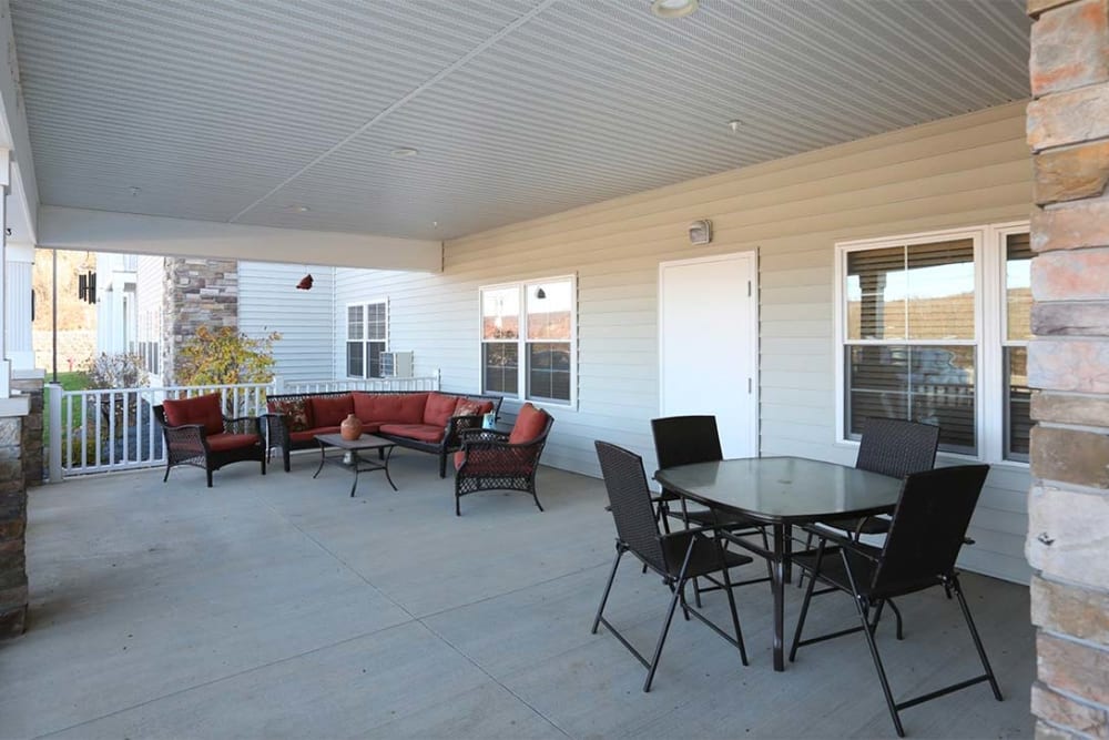 Deck with patio seating at Milestone Senior Living Cross Plains in Cross Plains, Wisconsin.