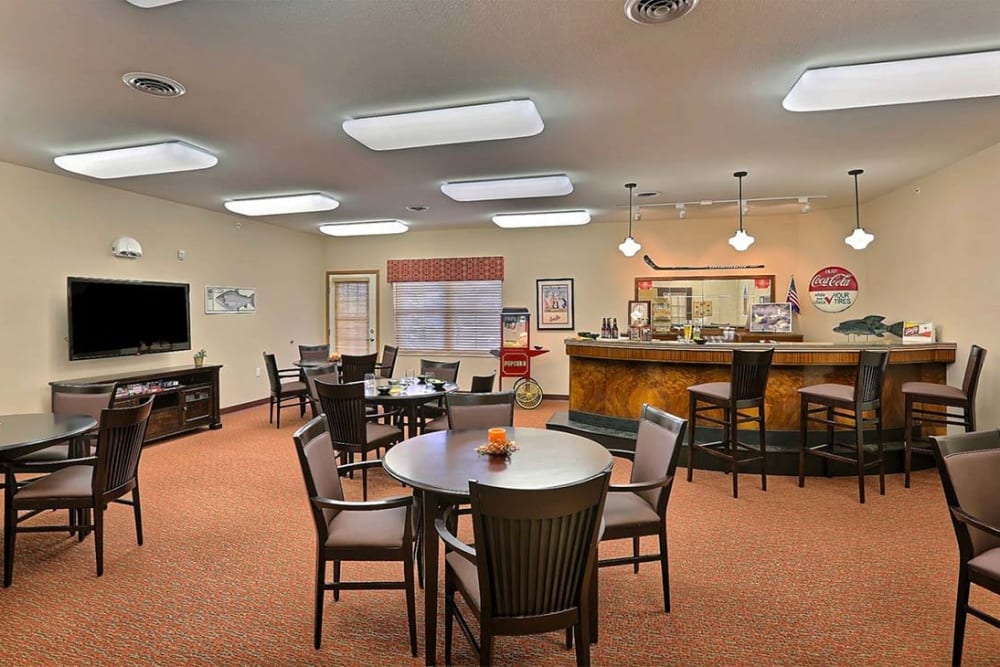 Resident game room with snack bar at Milestone Senior Living Cross Plains in Cross Plains, Wisconsin.