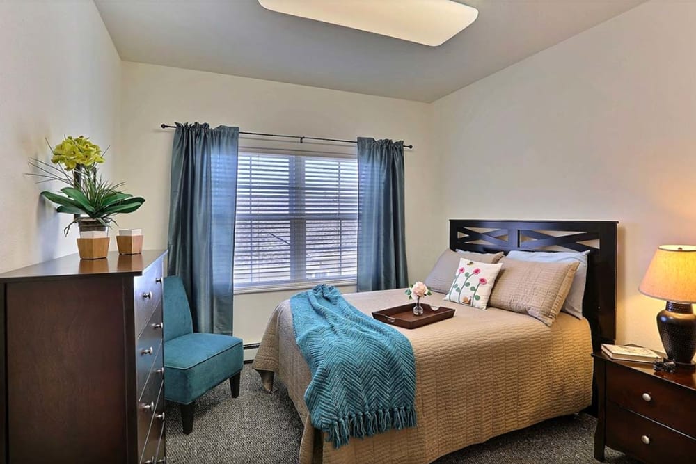 Spacious private resident bedroom at Milestone Senior Living Cross Plains in Cross Plains, Wisconsin.