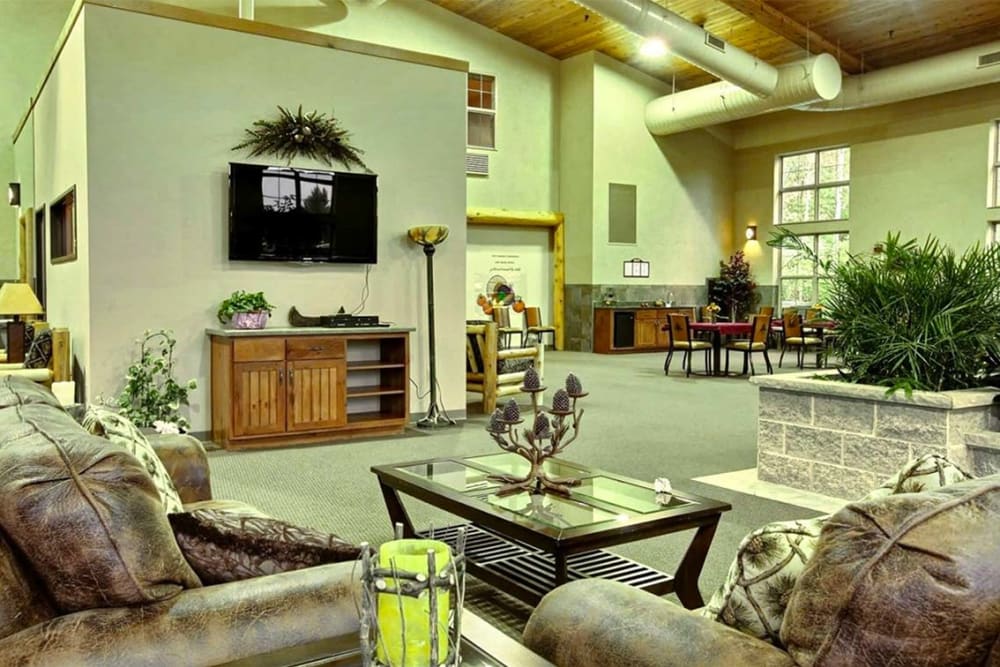 Resident TV lounge with comfortable seating at Milestone Senior Living Eagle River in Eagle River, Wisconsin.