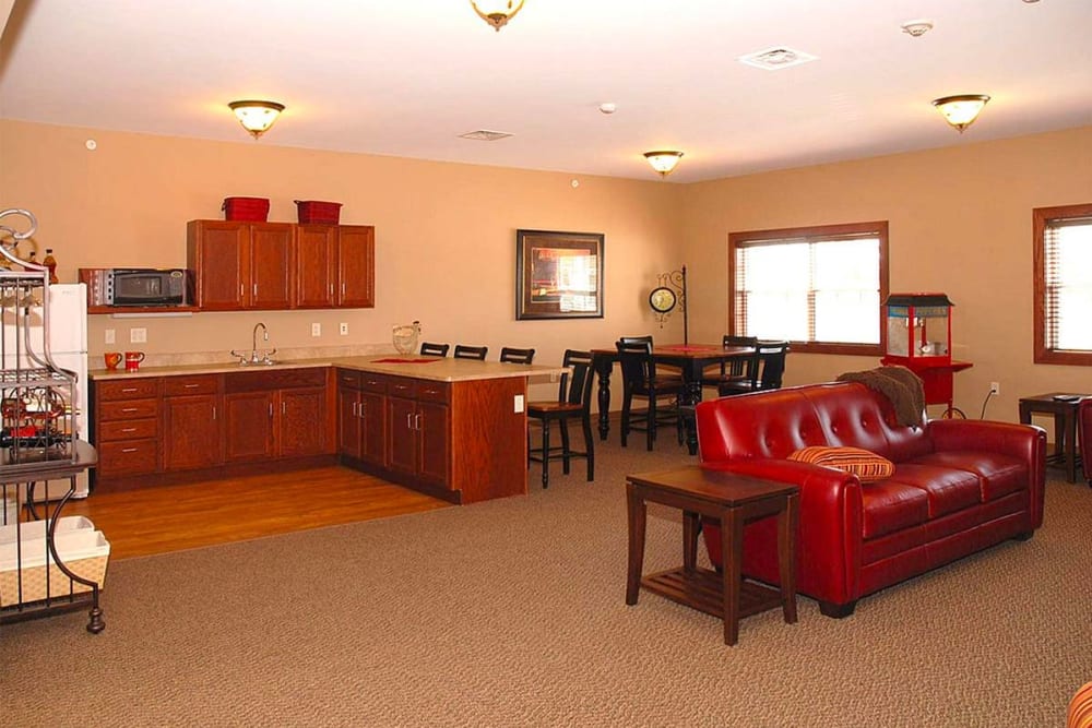 Resident activity room with kitchenette at Milestone Senior Living Eau Claire in Eau Claire, Wisconsin.