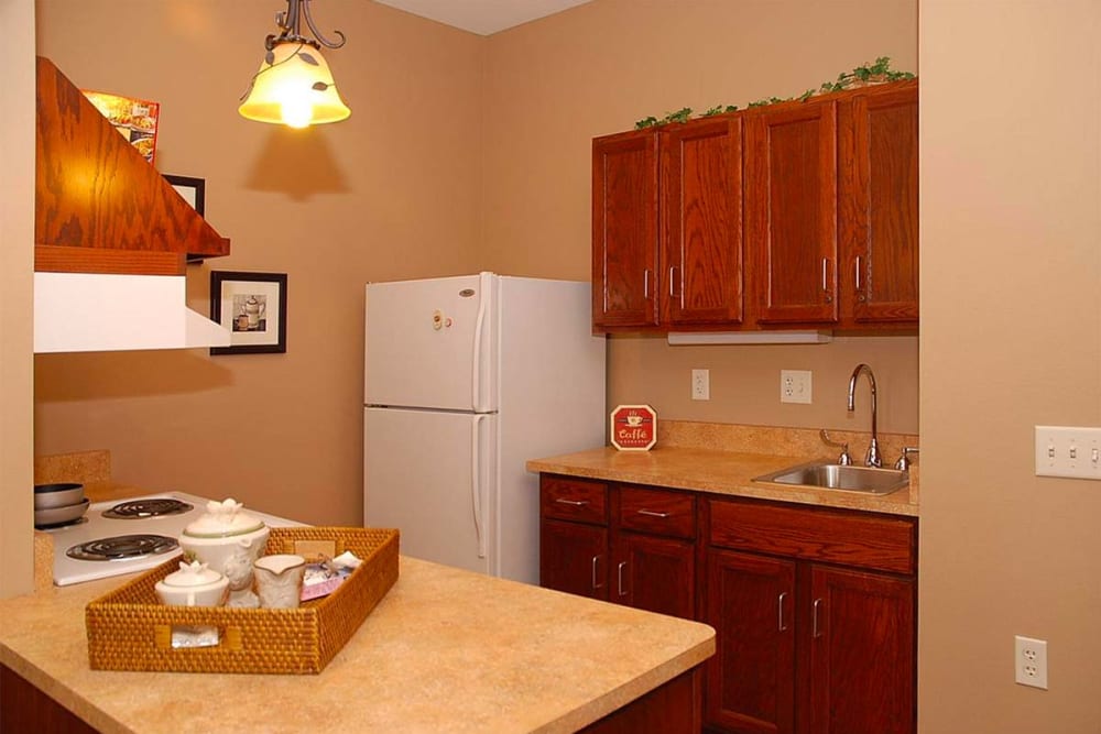 Resident apartment with full kitchen at Milestone Senior Living Eau Claire in Eau Claire, Wisconsin.