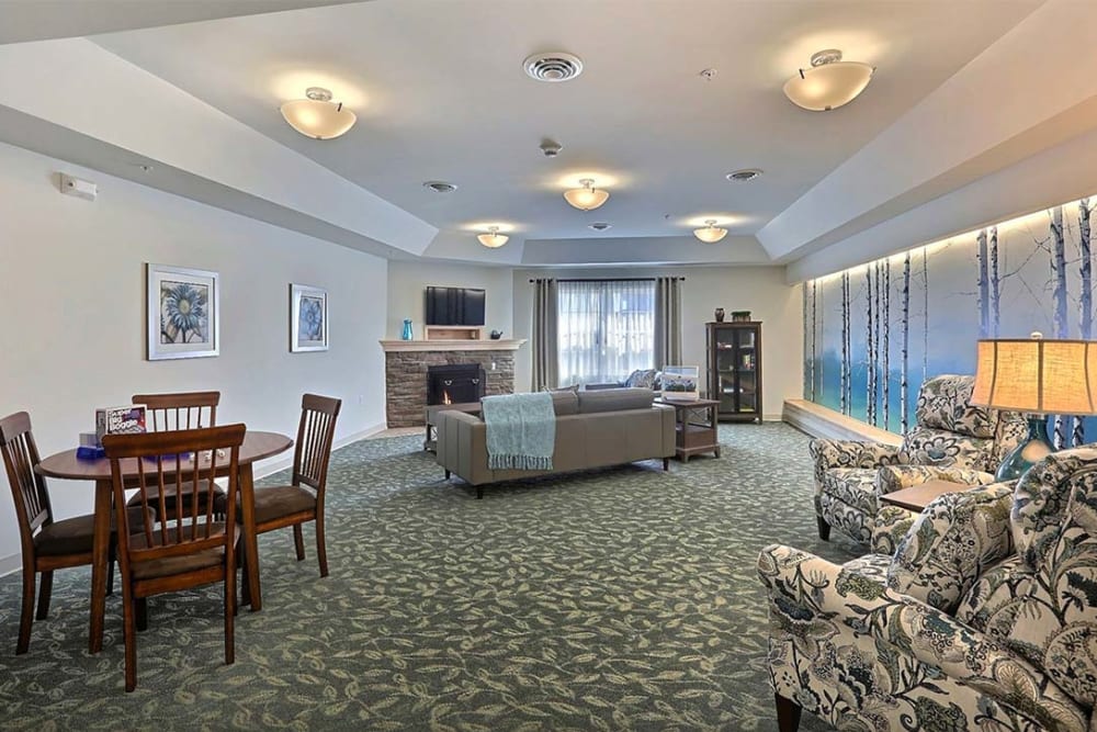 Community room with games and TV at Milestone Senior Living Stoughton in Stoughton, Wisconsin.