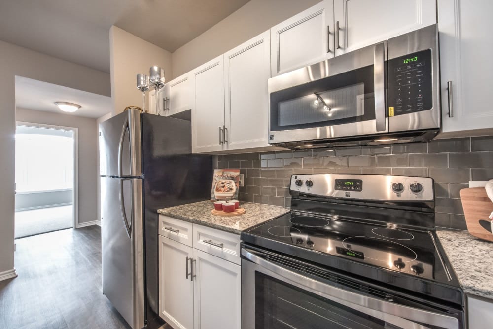 Stainless-steel kitchen appliances available at Olympus 7th Street Station in Fort Worth, Texas