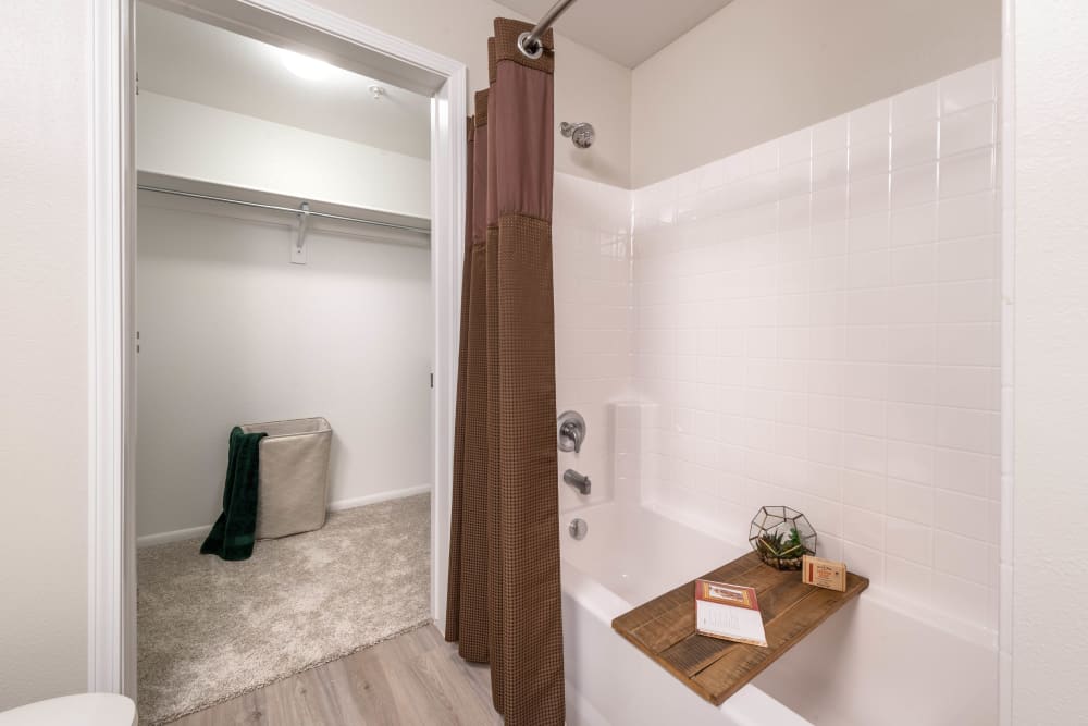 Extra closet storage in a model home's primary bathroom at Olympus at Daybreak in South Jordan, Utah