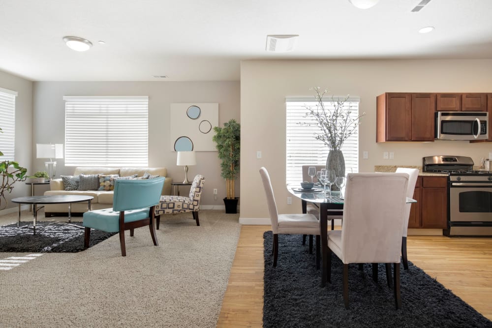 Dining table in model home at Olympus at the District in South Jordan, Utah