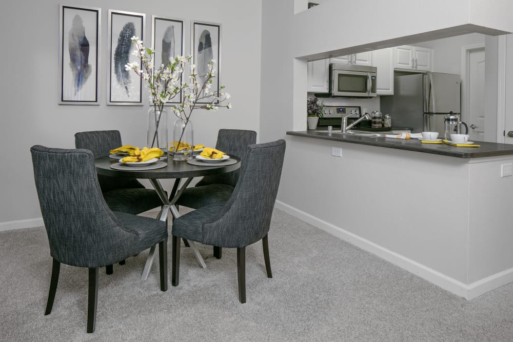 Dining room right next to kitchen allowing for some good conversation when guests are over at Cortland Village Apartment Homes in Hillsboro, Oregon