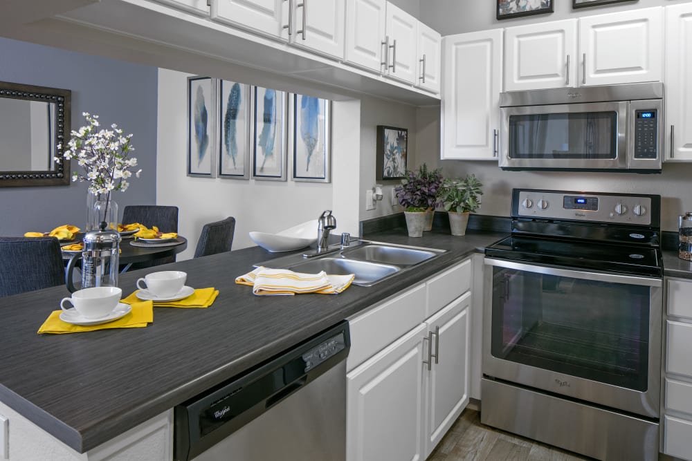 Kitchen with plenty of counter top space at Cortland Village Apartment Homes in Hillsboro, Oregon