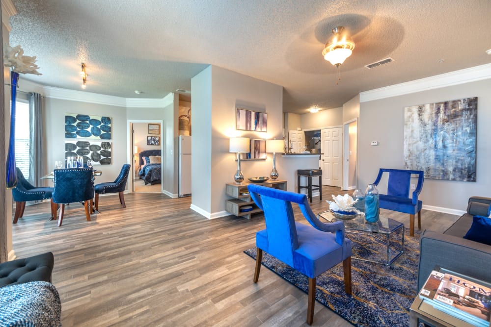 Ceiling fan and modern decor in the living space of a model home at Olympus Fenwick in Savannah, Georgia