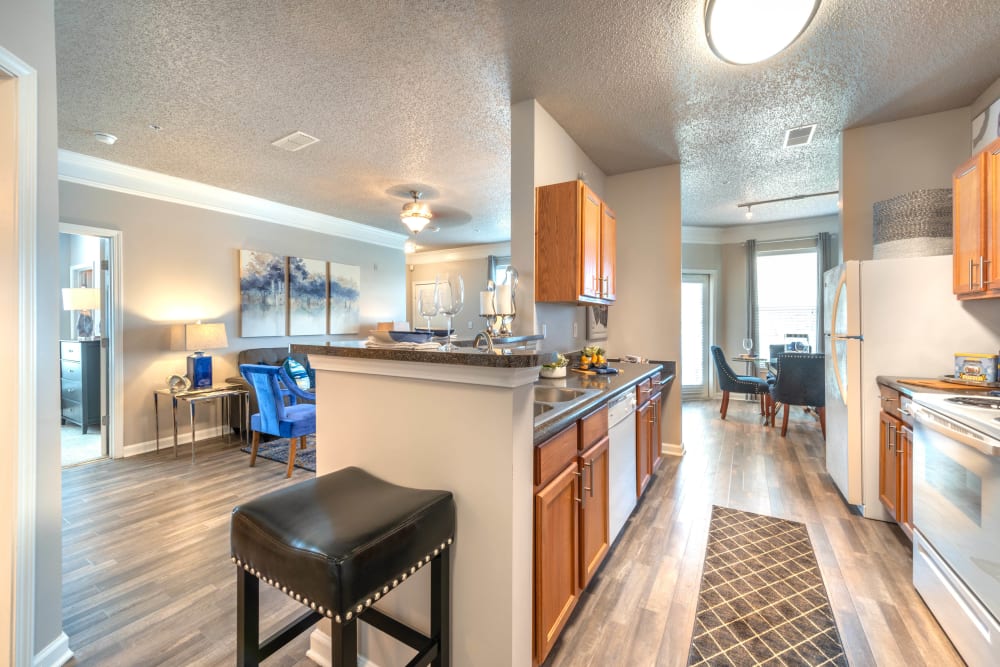 Natural light filling the open-concept living areas of a model home at Olympus Fenwick in Savannah, Georgia