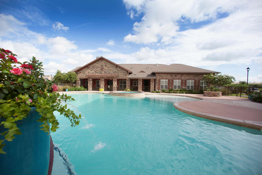 Resort-style swimming pool at Olympus Katy Ranch in Katy, Texas