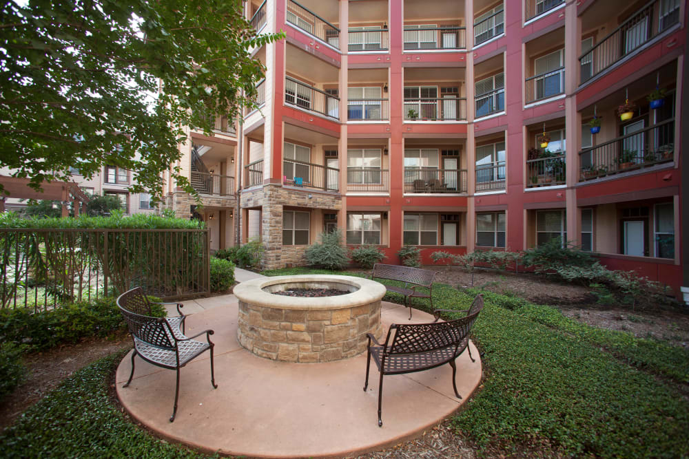 Fire pit area in the courtyard at Olympus Katy Ranch in Katy, Texas