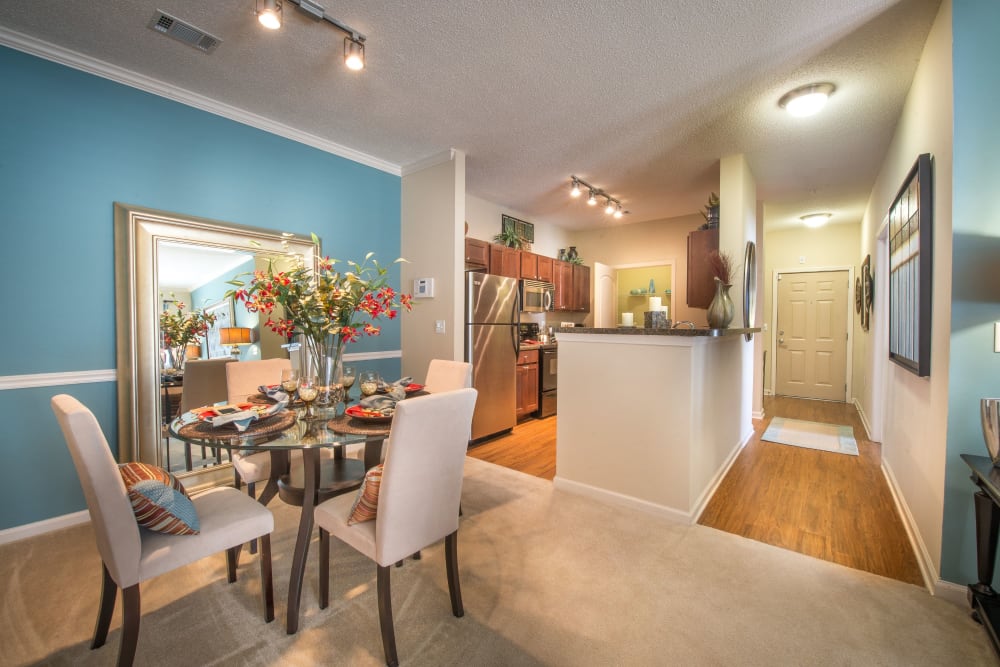 Beautiful faux wood flooring in kitchen at Odyssey Lake in Brunswick, Georgia