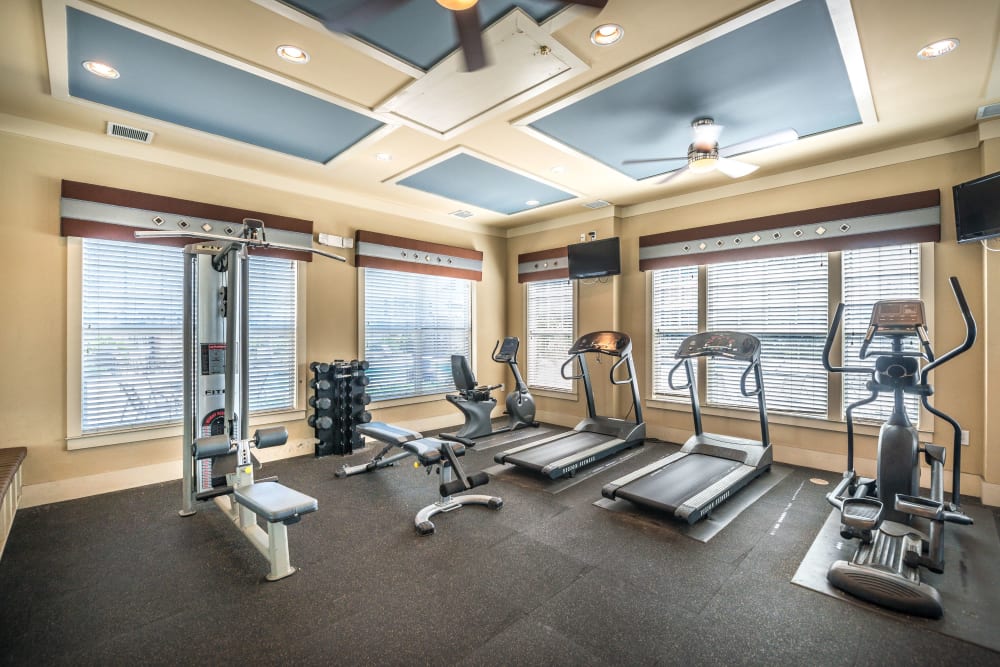 Fitness equipment in the onsite gym at Odyssey Lake in Brunswick, Georgia