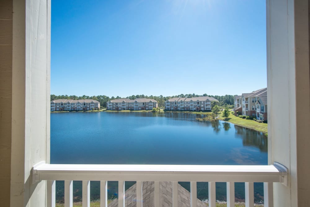 Private patio with views of the lake are available at Odyssey Lake in Brunswick, Georgia