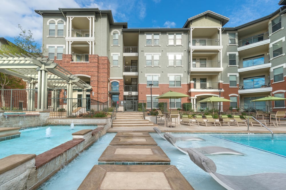 In-pool sun deck at Olympus Las Colinas in Irving, Texas