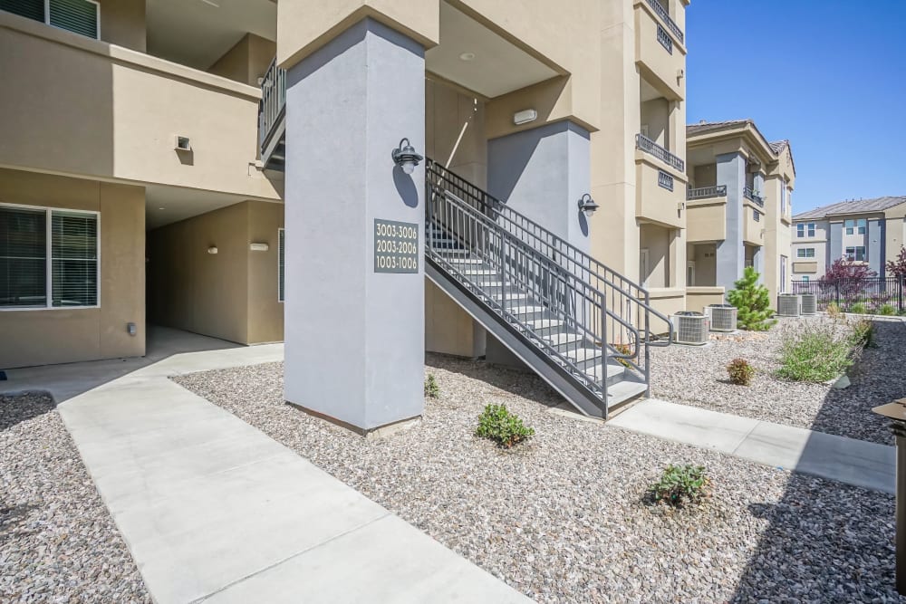 Well-maintained common areas between resident buildings at Olympus Northpoint in Albuquerque, New Mexico