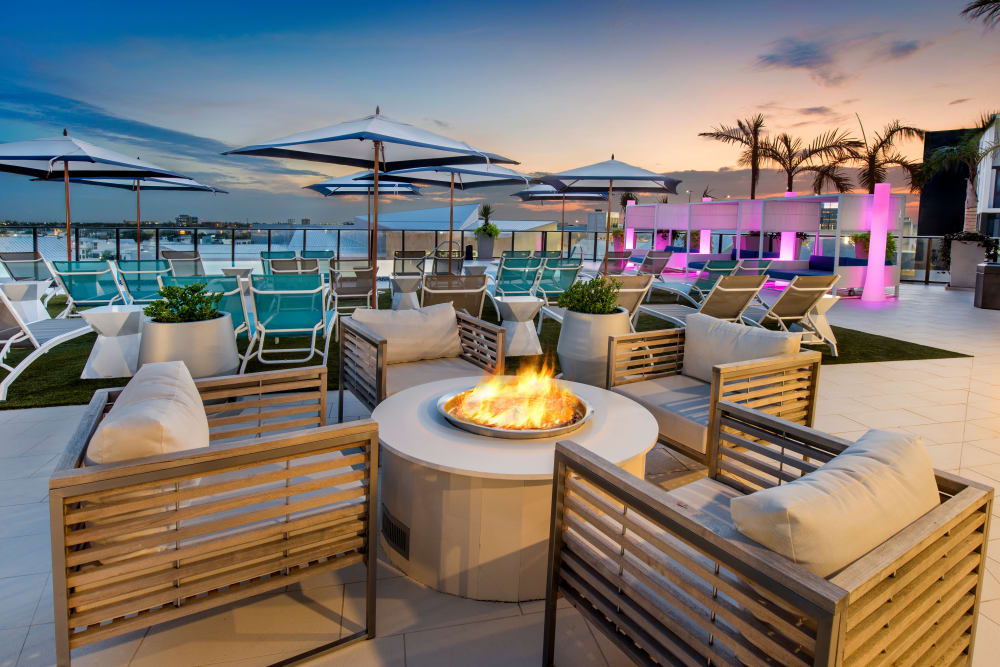 Outdoor lounge with a firepit at The Flats in Doral, Florida
