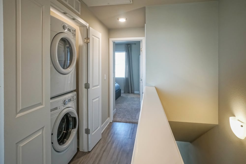 Model apartment's in-unit washer and dryer at Olympus Northpoint in Albuquerque, New Mexico