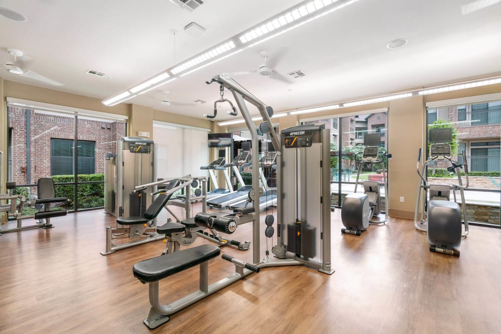Well-equipped onsite fitness center at Olympus Sierra Pines in The Woodlands, Texas