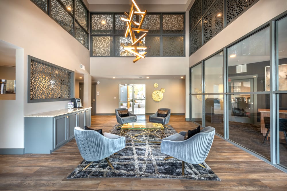 Vaulted ceiling and beautiful hardwood flooring in the lobby at Olympus Solaire in Albuquerque, New Mexico
