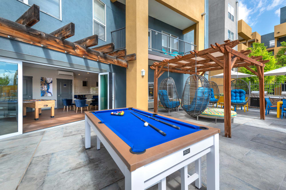 Outdoor billiards table at Olympus Solaire in Albuquerque, New Mexico