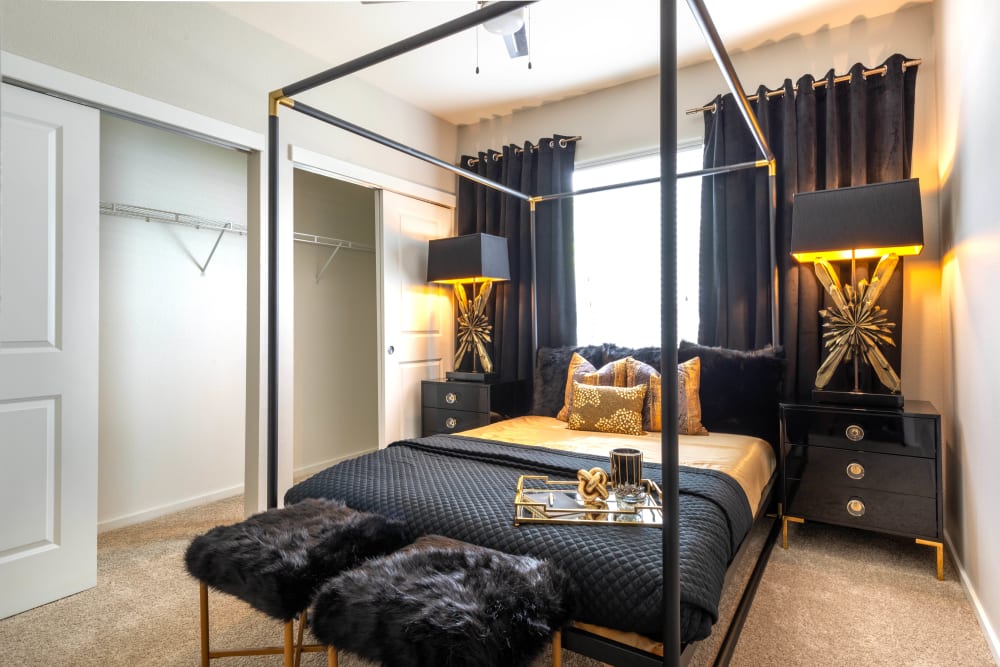 Ostentatiously furnished master bedroom in a model home at Olympus Solaire in Albuquerque, New Mexico