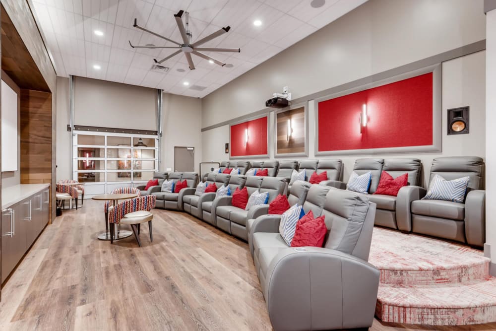Expansive onsite theater with comfortable seating at The Carriages at Fairwood Downs in Renton, Washington
