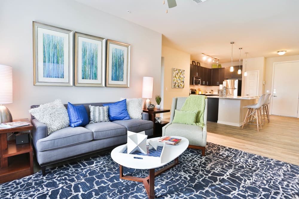 Bright and welcoming open-concept floor plan in a model apartment at Olympus Steelyard in Chandler, Arizona