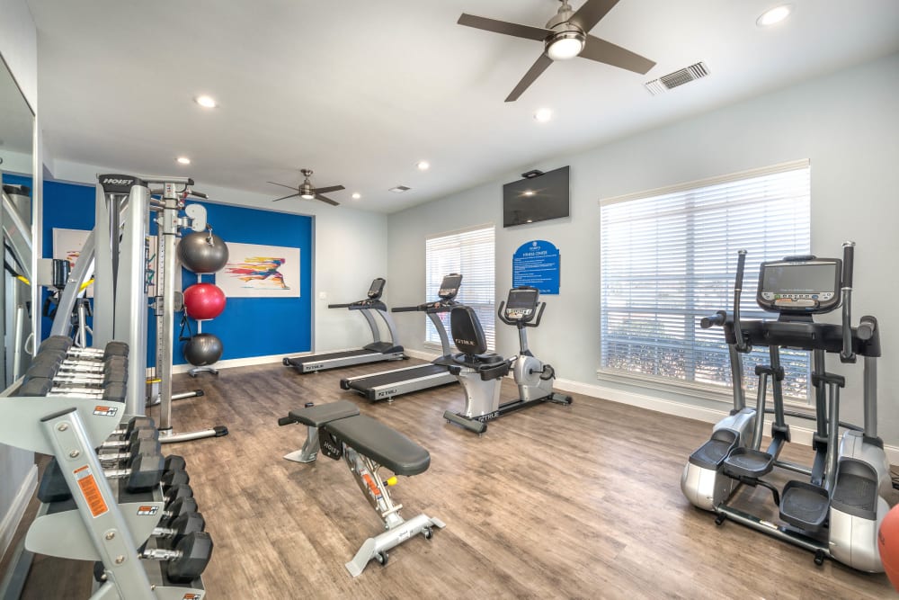 Well-equipped onsite fitness center at Olympus Stone Glen in Keller, Texas