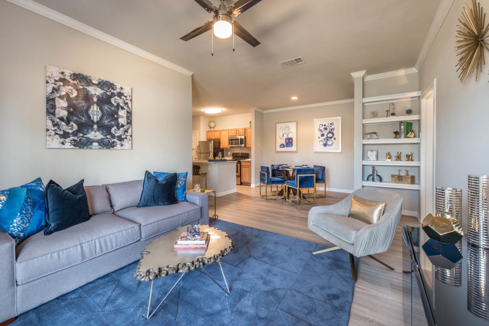 Comfortably furnished living space in a model home at Olympus Stone Glen in Keller, Texas