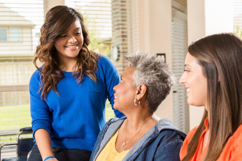 Family members come to visit at Milestone Senior Living Stoughton in Stoughton, Wisconsin.