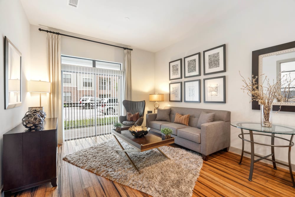 Comfortably furnished model home's living space at Olympus Sierra Pines in The Woodlands, Texas