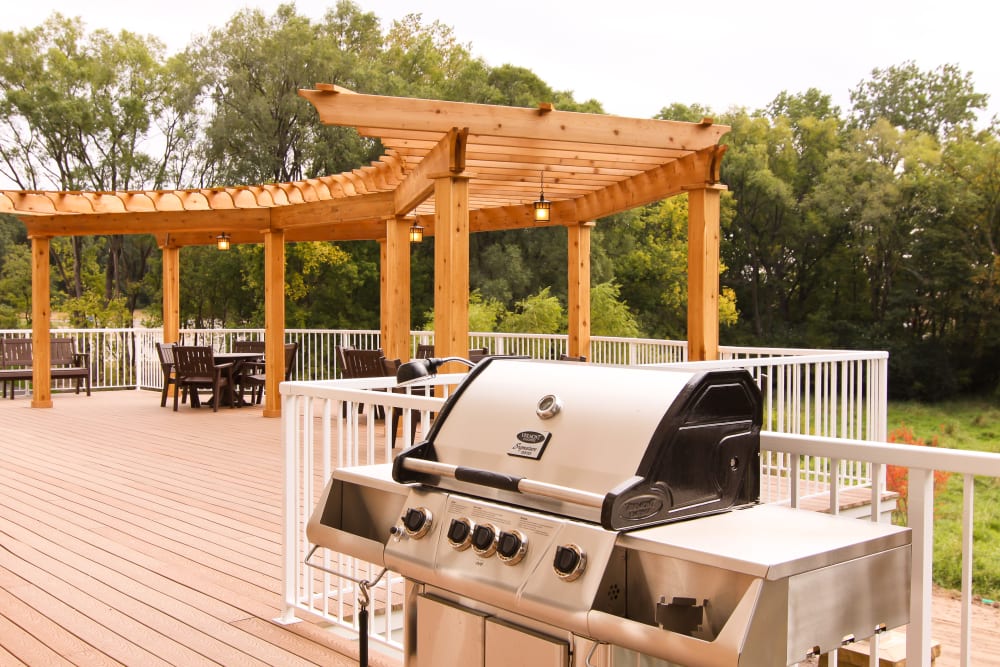 Outdoor patio with grill at Applewood Pointe of Roseville at Langton Lake in Roseville, Minnesota.